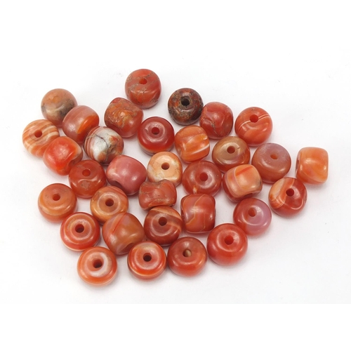 460 - Group of Islamic agate beads, approximately 1.3cm in diameter, approximate weight 170.0g