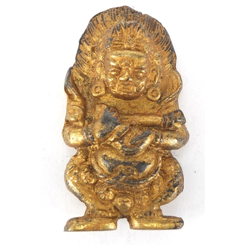 493 - Tibetan gilt metal mythical figure, 6cm high