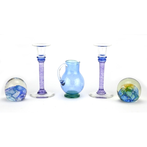 2365 - Helen Millard glassware including a pair of candlesticks and two paperweights, etched marks to the b... 