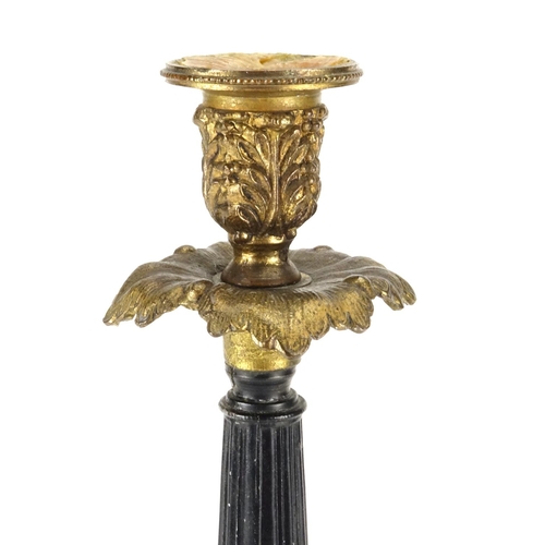 2160 - Ornate gilt candlestick with lion paw feet, raised on a triangular marble base, overall 37.5cm high