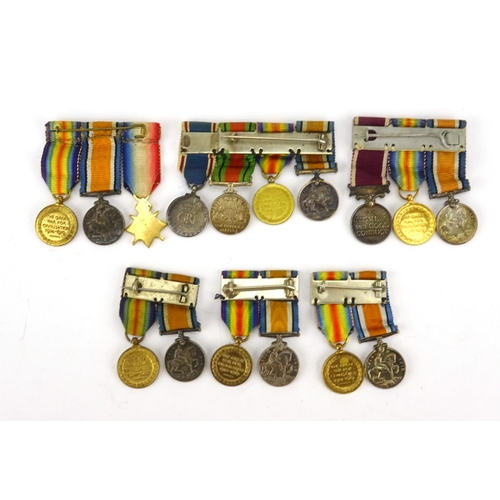 208 - Six British Military miniature medal groups including a trio and three pair's