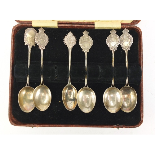 311 - Five silver rifle club teaspoons and one other, 12cm in length, approximate weight 114.0g