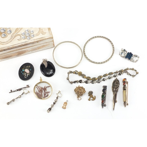 259 - Costume jewellery including a pietra dura panel, silver mounted pendant and Scottish Dirk design bro... 
