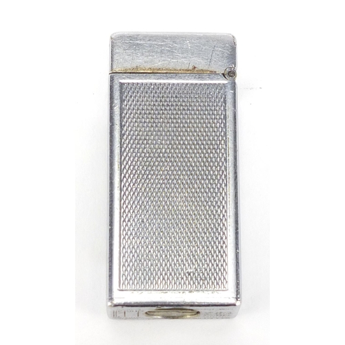 447 - Dunhill silver plated pocket lighter with engine turned decoration, 5cm in length