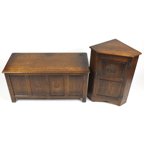 8 - Oak blanket box and corner cupboard carved with a Tudor rose, the corner cupboard with Webber Furnit... 
