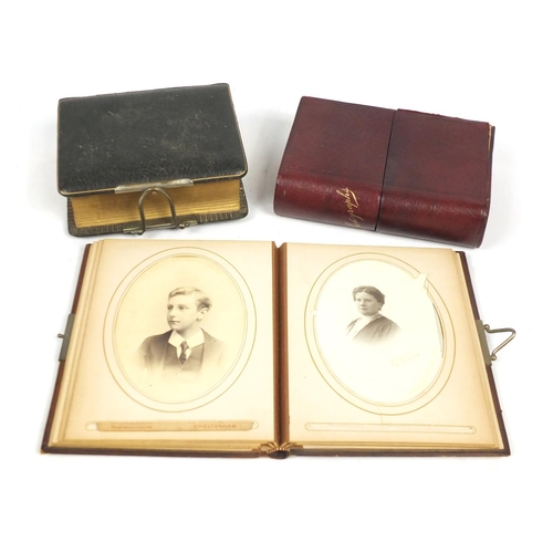 674 - Three Victorian leather cabinet card and photograph albums, with some photographs