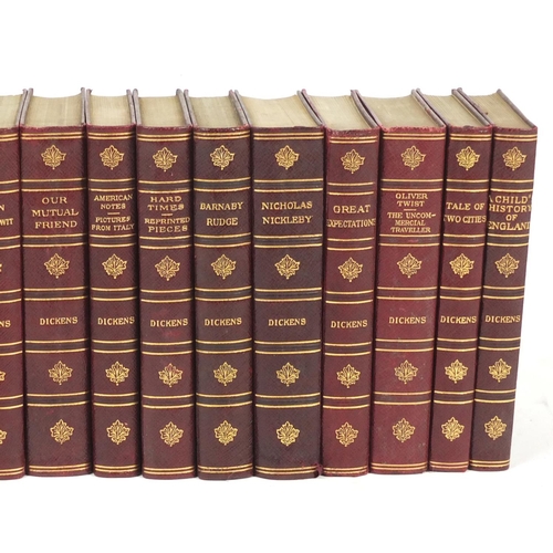 676 - Charles Dickens, nineteen leather bound volumes, published Chapman & Hall Ltd and Humphrey Milford