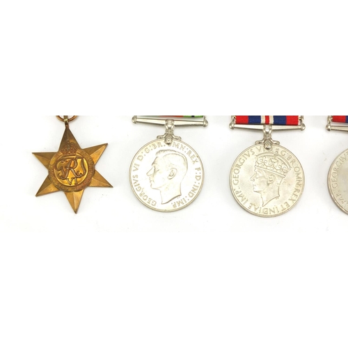 725 - Five British Military World War II medals with ribbons