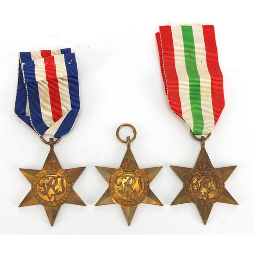 726 - Three British Military World War II medals comprising Africa, Italy, France and Germany Stars
