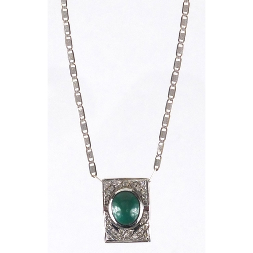 653 - 18ct white gold cabochon jade and diamond pendant, on a 18ct white gold necklace, the pendant 1.7cm ... 