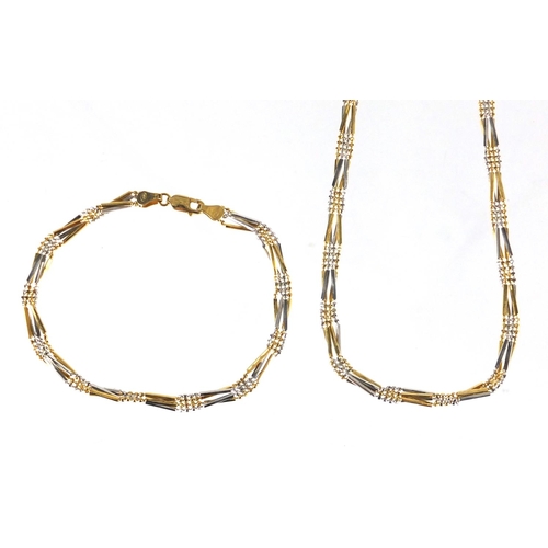 695 - 18ct two tone gold necklace and matching bracelet, the  necklace, 44cm in length, approximate weight... 