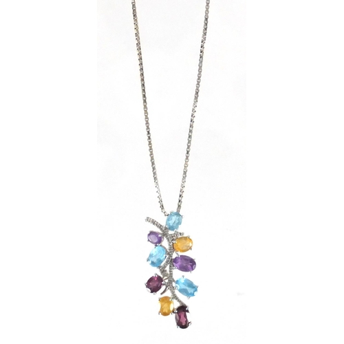 702 - 18ct white gold multi gem pendant on an 18ct white gold necklace, the pendant, 3cm in length, approx... 