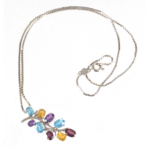 702 - 18ct white gold multi gem pendant on an 18ct white gold necklace, the pendant, 3cm in length, approx... 