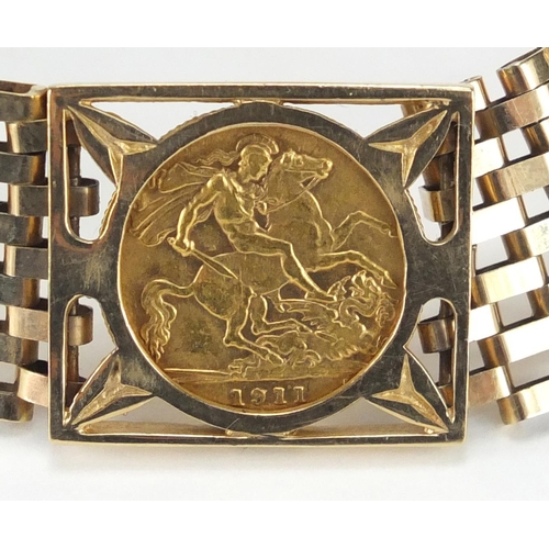 662 - George V 1911 gold half sovereign set in a 9ct gold six row gate bracelet, with love heart shaped pa... 