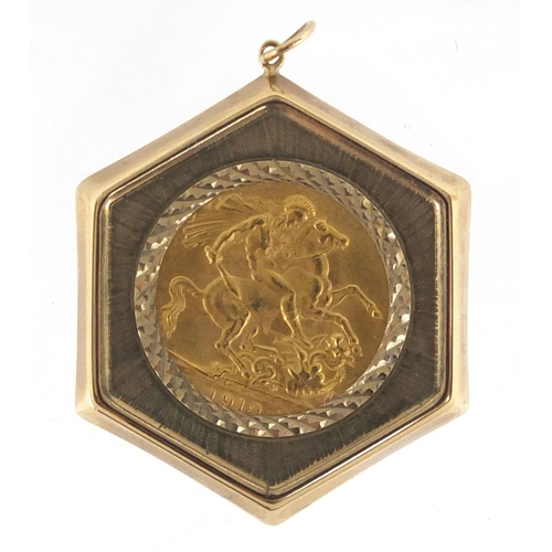 673 - George V 1919 gold sovereign set in a 9ct gold pendant mount, approximate weight 11.6g