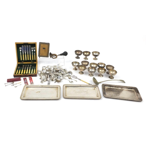 139 - Silver plate including John R Buss & Sons canteen, trays, pair of silver sugar tongs and silver must... 