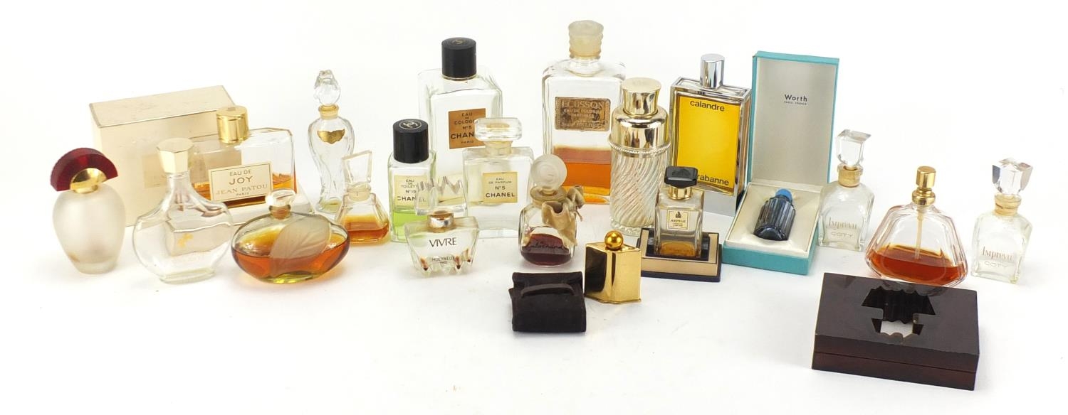 Vintage perfume bottles including Chanel, Jicky, Nina Ricci and
