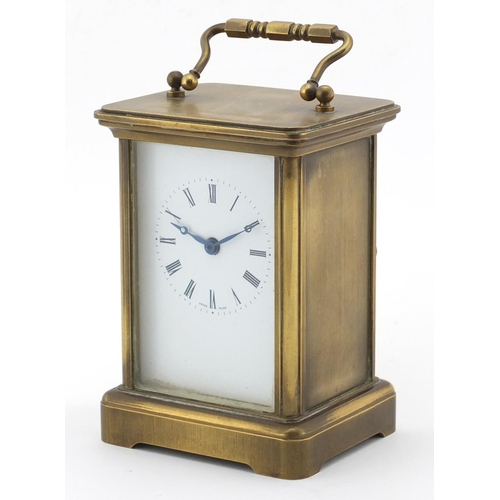 2185 - Brass cased carriage clock with enamelled dial and Roman numerals, 11cm high