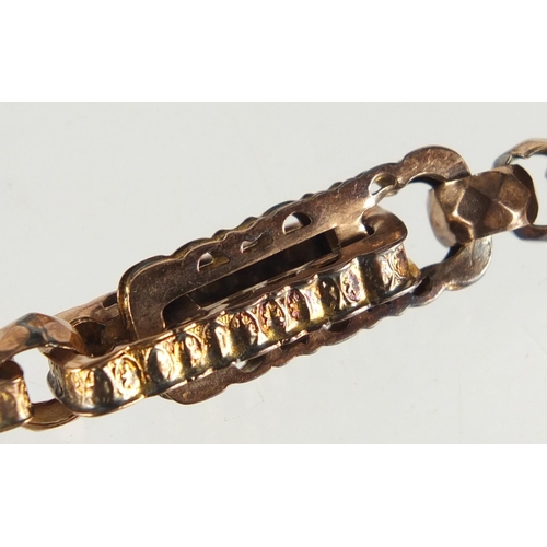 692 - Victorian 9ct rose gold engraved link watch chain with T-bar, 40cm in length, approximate weight 31.... 