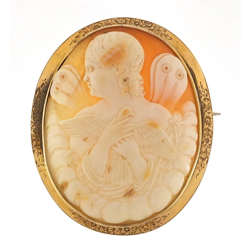 667 - Large Victorian unmarked gold cameo brooch depicting a young maiden holding a dove, 6.5cm in length,... 