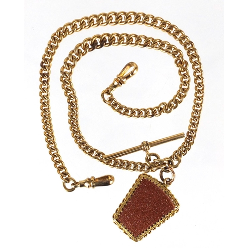 669 - 9ct gold watch chain with T-bar and red sandstone pendant, 44cm in length, approximate weight 48.5g