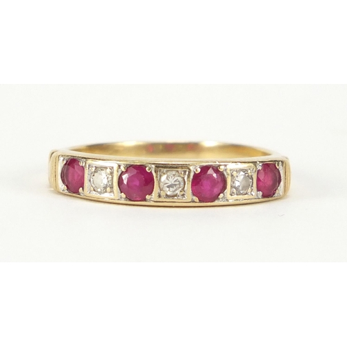 703 - Unmarked gold ruby and diamond half eternity ring, size T, approximate weight 3.1g