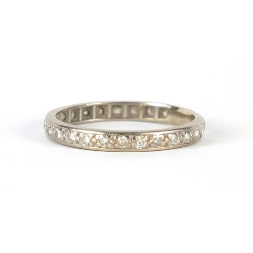 684 - Unmarked white metal diamond eternity ring, size T, approximate weight 3.3g