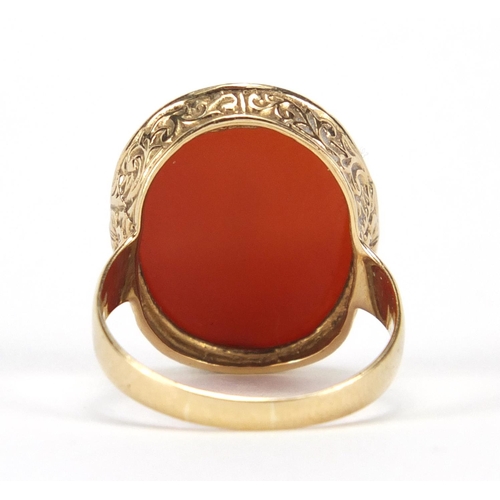 739 - 9ct gold carnelian signet ring, the setting moulded with flowers, size Q,  approximate weight 4.7g