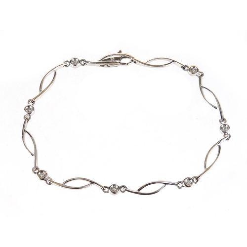 737 - 9ct white gold diamond bracelet, 18cm in length, approximate weight 4.6g