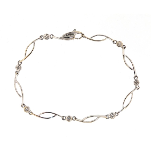 737 - 9ct white gold diamond bracelet, 18cm in length, approximate weight 4.6g