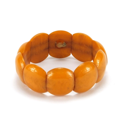 764 - Butterscotch amber coloured bracelet, approximate weight 21.5g