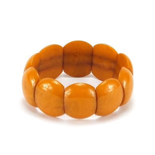 764 - Butterscotch amber coloured bracelet, approximate weight 21.5g