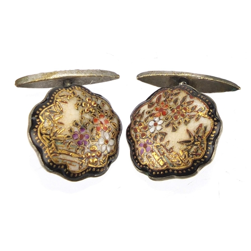 338 - Pair of Japanese Satsuma pottery cufflinks, hand painted with flowers, each 2cm in diameter