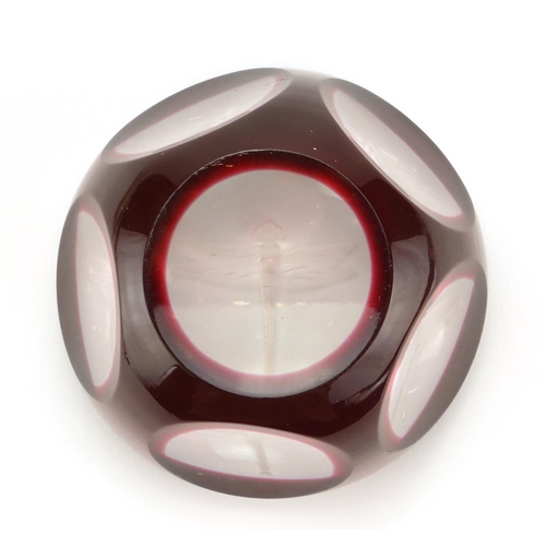 2382 - Bohemian red overlaid glass paperweight etched with a dragonfly, 7.5cm in diameter