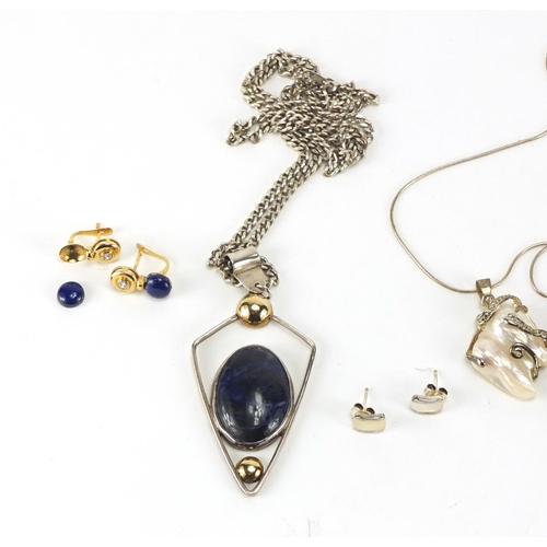 204 - Silver and white metal jewellery set with amber, Lapis Lazuli and Mother of Pearl