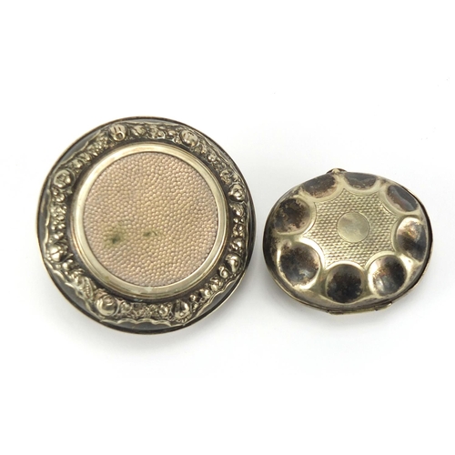 506 - Two silver coloured metal trinkets with hinged lids, the largest 7.5cm in diameter