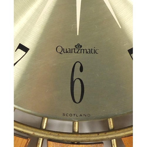 2106 - Seth Thomas teak and brass sunburst design clock, 67.5cm in diameter