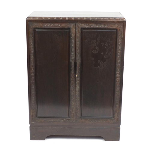 5 - Chinese hardwood two door tallboy, fitted with six drawers, 125cm H x 90cm W x 46cm D