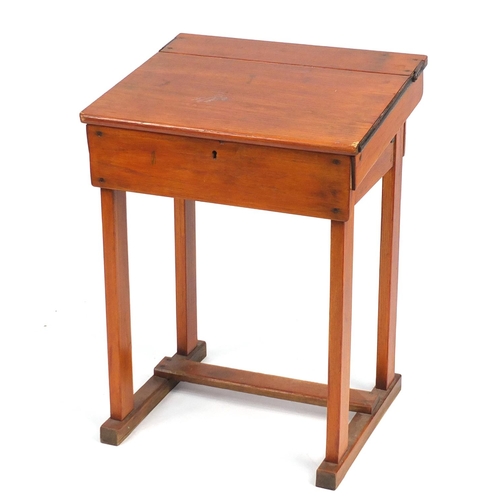 29 - Vintage stained pine school desk, with The Educational Supply stamp to the back, 82.5cm H x 61cm W x... 