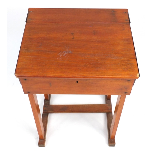 29 - Vintage stained pine school desk, with The Educational Supply stamp to the back, 82.5cm H x 61cm W x... 