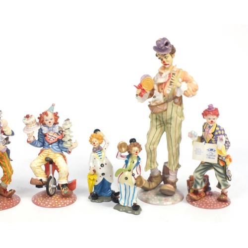 70 - Decorative clown figures including The Leonardo Collection, the largest 39cm high
