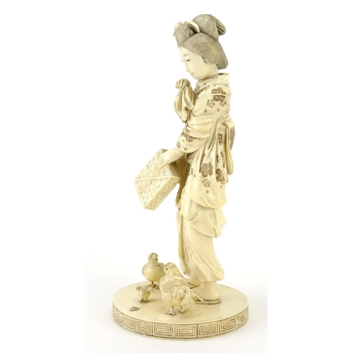 349 - Good Japanese Meiji period carved ivory okimono of a Geisha girl and three chickens, incised marks a... 