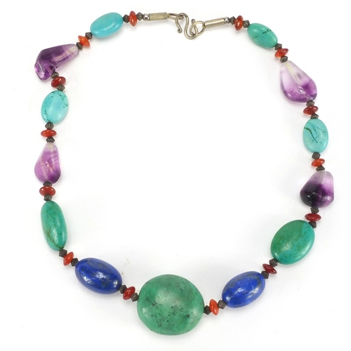 263 - Turquoise, lapis lazuli and amethyst polished stone necklace, 42cm in length