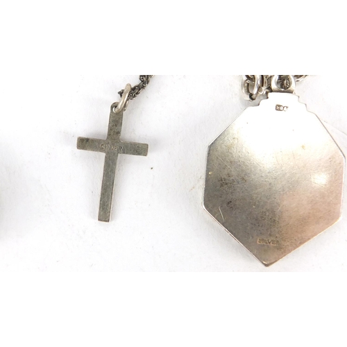 214 - Four silver and white metal pendants on chains, approximate weight 37.5g