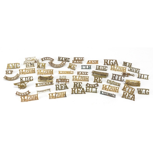734 - Military interest cap badges including RFA, Norfolk and Essex