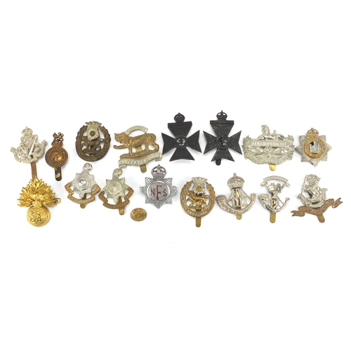 214 - British Military cap badges including Leicestershire Regiment, York and Lancaster Regiment and Royal... 