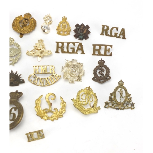 737 - Military interest cap badges including Northamptonshire and Royal Canadian Engineers