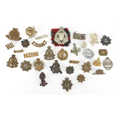 752 - Military interest cap badges including Royal Engineers and Middlesex Regiment