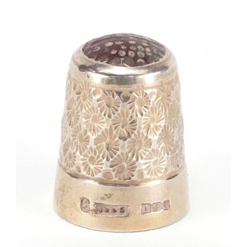 315 - Silver thimble with inset hard stone top, indistinct Birmingham hallmarks, 2.2cm high