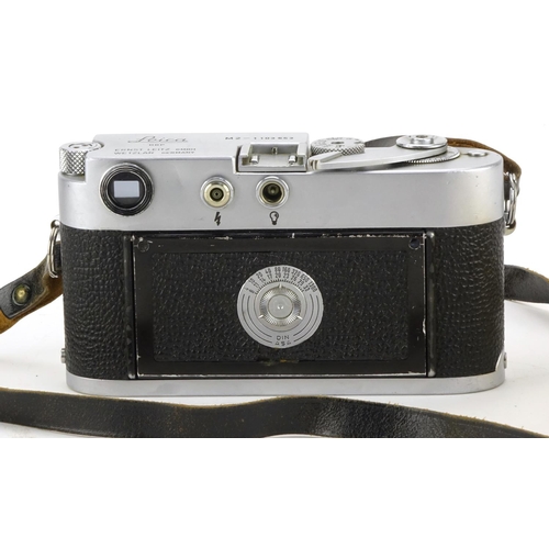 99 - Leica M2 Rangefinder Camera with Elmar lens and leather case, the camera serial number 1103653